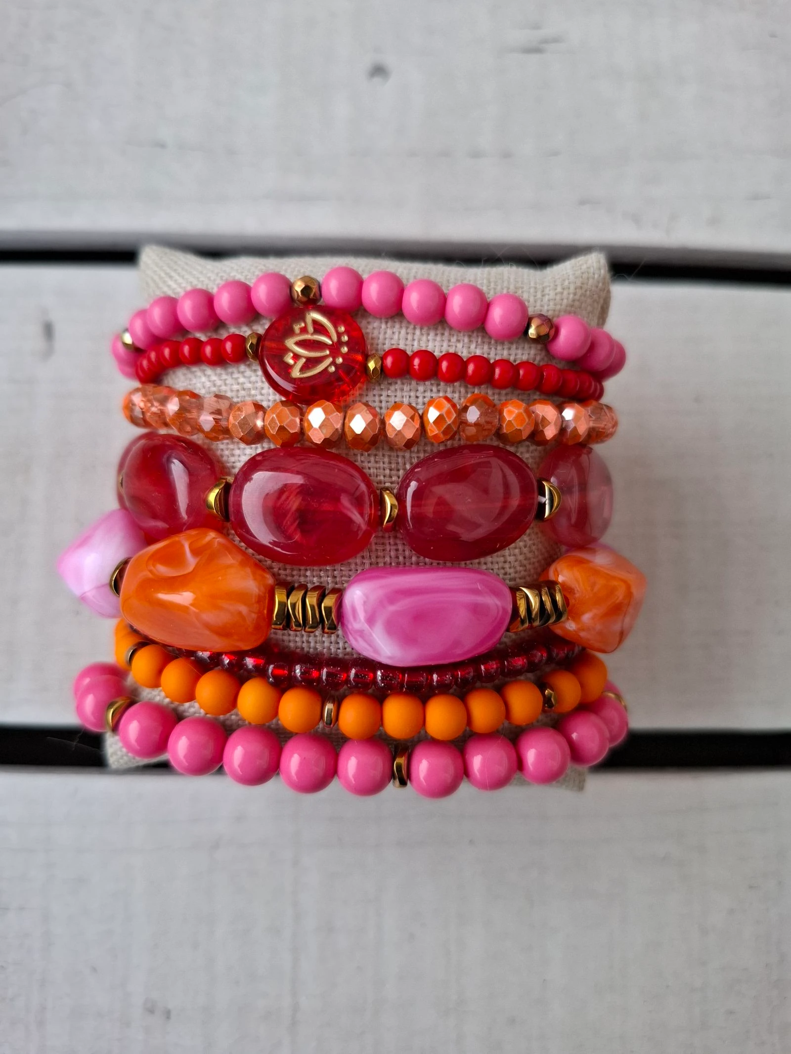 Bracelet/ armbandenset in rood/roze/oranje